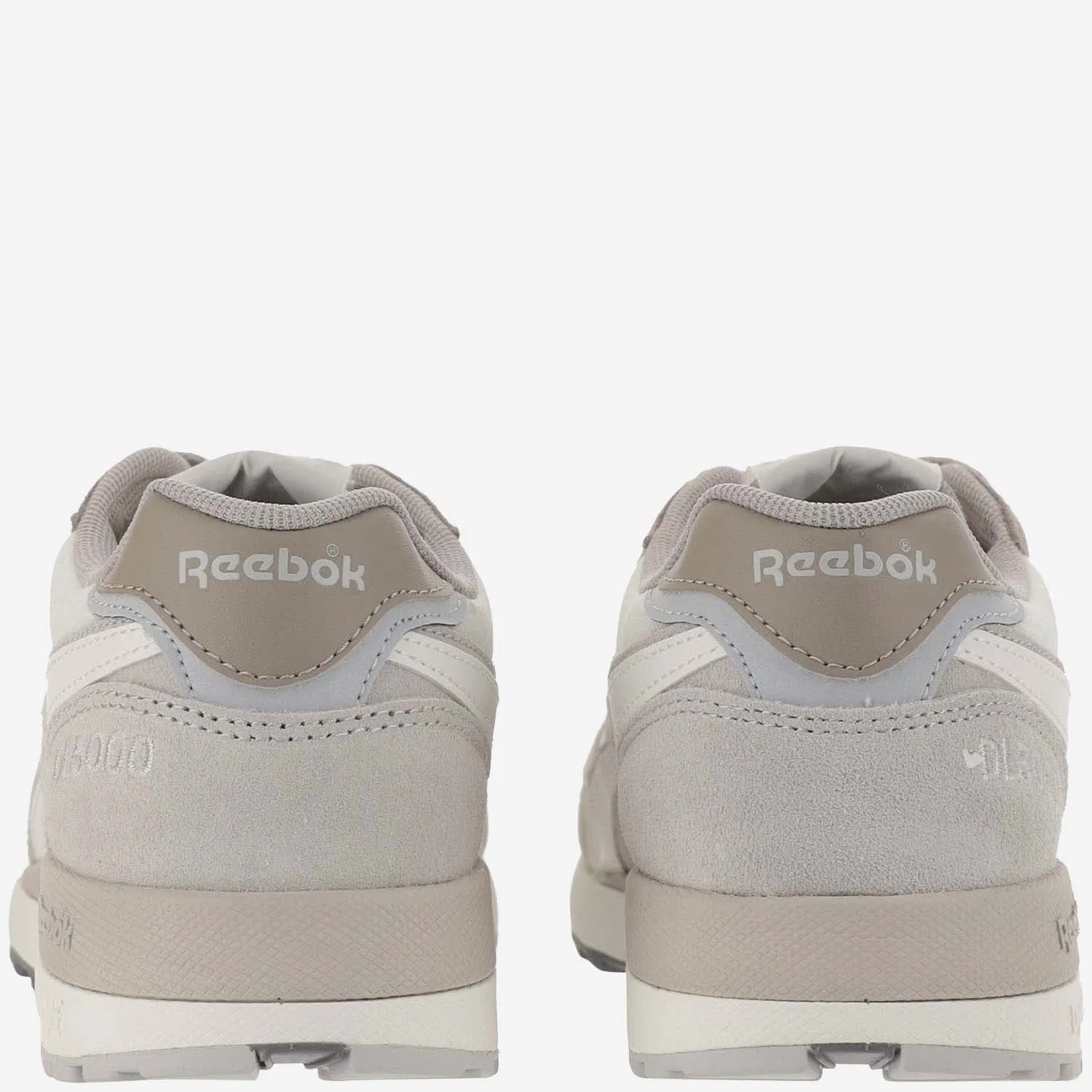 Reebok    Reebok Beige Shoe Rubberized Sole